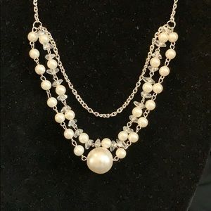 White pearl plastic necklace 11in adjustable 2in